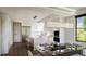 Modern kitchen with a marble island, stainless steel appliances, and an elegant hanging light fixture at 523 W Princeton St # 1, Orlando, FL 32804