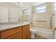 Bathroom with a single sink vanity, a shower-tub combo with grab bars and a window at 604 Cheviot Ct, Apopka, FL 32712