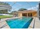 Relaxing screened-in pool area perfect for entertaining and enjoying the beautiful backyard view at 604 Cheviot Ct, Apopka, FL 32712