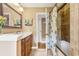 Bathroom featuring a vanity and shower with glass doors at 676 Dunblane Dr, Winter Park, FL 32792