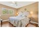 Bright bedroom featuring hardwood floors and a sunny window at 676 Dunblane Dr, Winter Park, FL 32792