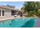 Beautiful pool featuring a well-maintained pool area and landscaped backyard, perfect for outdoor activities at 676 Dunblane Dr, Winter Park, FL 32792