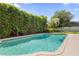 Backyard pool surrounded by lush landscaping at 676 Dunblane Dr, Winter Park, FL 32792