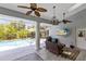Enjoy outdoor living at its finest with this covered patio, outdoor kitchen, and mounted television at 718 Glen Eagle Dr, Winter Springs, FL 32708