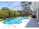 Enjoy the Florida sunshine in your private screened-in pool with lush landscaping and inviting gazebo at 718 Glen Eagle Dr, Winter Springs, FL 32708