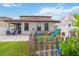 View of the backyard with a play set, well manicured lawn and a nice patio area at 731 Arbor Pointe Ave, Minneola, FL 34715