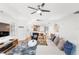 Inviting living room with comfortable seating, contemporary decor, and abundant natural light at 7650 Whisper Way # 104, Reunion, FL 34747