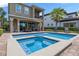 A beautiful in-ground pool and spa, great for outdoor entertaining and relaxation, with ample patio space at 796 Desert Mountain Ct, Reunion, FL 34747