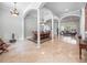 Spacious dining room with tall columns and travertine floors, perfect for entertaining guests at 8531 Cypress Hollow Ct, Sanford, FL 32771
