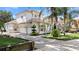 Beautiful home with lush landscaping, elegant design, and a well-manicured lawn at 8531 Cypress Hollow Ct, Sanford, FL 32771