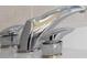 Close-up of a sleek, chrome bathroom faucet with stylish, easy-to-use handles at 8531 Cypress Hollow Ct, Sanford, FL 32771