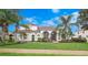 Stunning single-Gathering home with a clay tile roof, lush landscaping, and inviting curb appeal at 8531 Cypress Hollow Ct, Sanford, FL 32771