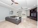Bright living room with entertainment center, comfortable seating, and large windows at 8531 Cypress Hollow Ct, Sanford, FL 32771