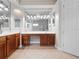 Bathroom includes a double vanity with seating area and an oversized mirror at 8531 Cypress Hollow Ct, Sanford, FL 32771
