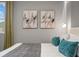 Tastefully decorated bedroom with a king sized bed, modern furniture and neutral decor at 8928 Coconut Breeze Dr, Kissimmee, FL 34747