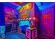This themed bedroom features a custom-built bunk bed and murals on the walls at 8928 Coconut Breeze Dr, Kissimmee, FL 34747