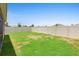 Spacious backyard featuring a well-maintained lawn and a secure privacy fence at 927 Denali Dr, Orange City, FL 32763