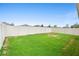 Expansive backyard featuring lush lawn and a surrounding white privacy fence at 927 Denali Dr, Orange City, FL 32763