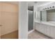 Neutral bathroom featuring tile flooring, white cabinet and walk-in shower at 9514 Se 168Th Maplesong Ln, The Villages, FL 32162