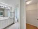 Neutral bathroom featuring tile flooring, white cabinet and vanity at 9514 Se 168Th Maplesong Ln, The Villages, FL 32162