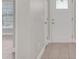 Inviting entryway showcases neutral walls, decorative front door, and tile floors, providing a warm welcome at 1206 Beechdale Ct, Deltona, FL 32725