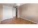 Bedroom with hardwood floors and large closet at 1312 Azalea Way, Winter Garden, FL 34787