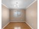 Bedroom with hardwood floors, a neutral paint scheme, and a window at 1312 Azalea Way, Winter Garden, FL 34787