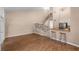 Spacious living room with hardwood floors, high ceilings, and a staircase to the second floor at 1312 Azalea Way, Winter Garden, FL 34787