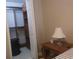 Bedroom with a spacious closet, bedside table and neutral walls at 13200 Mallard Cove Blvd, Orlando, FL 32837