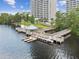 Beautiful aerial view of the lake pier and boat slips for easy access to the water at 13427 Blue Heron Beach Dr # 404, Orlando, FL 32821