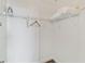 Walk in closet features wire shelving for ample storage at 13427 Blue Heron Beach Dr # 404, Orlando, FL 32821