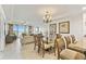 Dining area featuring water views and ample seating space at 13427 Blue Heron Beach Dr # 404, Orlando, FL 32821
