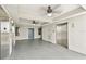 Building elevator lobby featuring elevators and unit access doors with ceiling fans and overhead lighting at 13427 Blue Heron Beach Dr # 404, Orlando, FL 32821