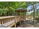 A community gazebo sits at the end of a boardwalk surrounded by beautiful landscaping, enhancing outdoor enjoyment at 13427 Blue Heron Beach Dr # 404, Orlando, FL 32821