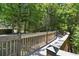 Picturesque wooden pathway winding through lush greenery, creating a tranquil environment for walking and enjoying nature at 13427 Blue Heron Beach Dr # 404, Orlando, FL 32821