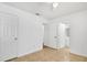Cozy bedroom with tile floors, closet, and an attached bathroom at 1447 Candlewyck Dr, Orlando, FL 32807