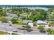 Scenic aerial view of the neighborhood by the lake at 1511 E Horatio Ave, Maitland, FL 32751