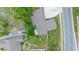 Overhead view of the property showcasing its proximity to nearby homes and greenery at 1511 E Horatio Ave, Maitland, FL 32751