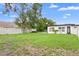 Spacious backyard offers a lawn and a privacy fence, perfect for outdoor activities at 1511 E Horatio Ave, Maitland, FL 32751