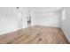 Bright bedroom featuring wood-look tile flooring, creating a stylish and modern space at 1511 E Horatio Ave, Maitland, FL 32751