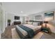 Comfortable main bedroom with wood-look tile flooring and ample natural light at 1511 E Horatio Ave, Maitland, FL 32751