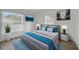 Comfortable bedroom featuring a large window with blinds and calming wall art at 1511 E Horatio Ave, Maitland, FL 32751