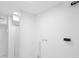 Bright laundry room with a washing machine hookup and storage at 1511 E Horatio Ave, Maitland, FL 32751