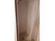 Walk-in shower with clear curtain and laminate flooring at 1525 Hilltop Rd, Casselberry, FL 32707
