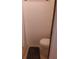 Small bathroom showcasing the toilet and flooring at 1525 Hilltop Rd, Casselberry, FL 32707