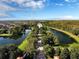 Beautiful aerial view of the long entry way into the community at 15647 Braintree Ln, Winter Garden, FL 34787