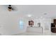 Open-concept living room featuring an eat-in kitchen and a spacious, bright interior at 15647 Braintree Ln, Winter Garden, FL 34787