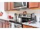 This modern kitchen features stainless steel appliances and granite countertops at 1625 Nassau Point Trl, Kissimmee, FL 34747