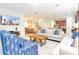 Bright living room featuring stylish furniture and an open floor plan concept at 1625 Nassau Point Trl, Kissimmee, FL 34747