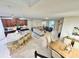 Open concept living space featuring the kitchen, dining room, and living room combination at 1625 Nassau Point Trl, Kissimmee, FL 34747
